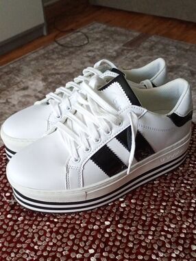 Byblos White Sneakers with Black Stripe Accents